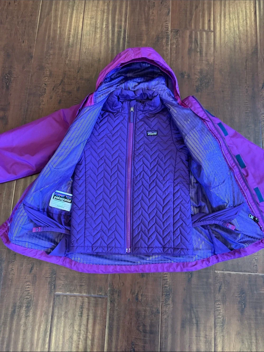 Patagonia Kids Purple Hooded Jacket with another removable jacket on the inside